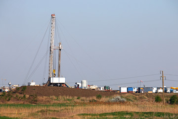 land oil drilling rig on oilfield