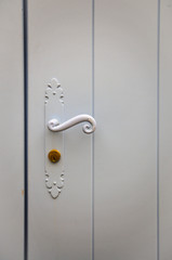 White door with lock and handle