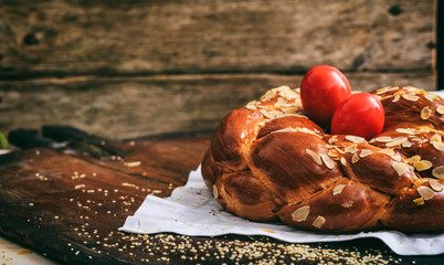 Easter bread and eggs on a table - copy space