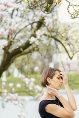 Beautiful Girl with Spring Flowers. Fresh and beauty concept.