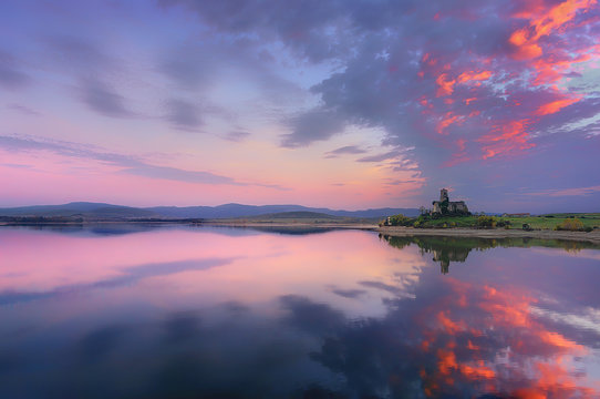 ruins of Azua church with reservoir reflections