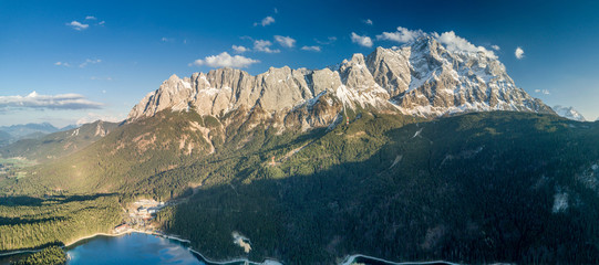 Aerial view of the Wetterstein mountains and the world famous Zugspitze in Bavaria in the evening...