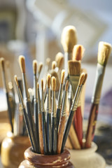 A collection of old sable paintbrushes