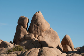 Closeup of rocks that look like a wolf howling at the moon