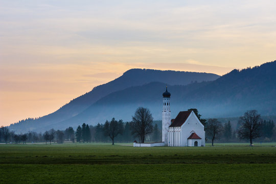 Church, Schwangau, Federal State of Bavaria, Germany..Saint Coloman chapel at dawn.