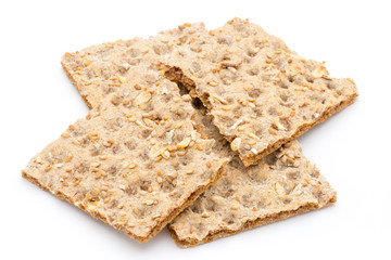 Stack of wholegrain crispy bread with sunflower, chia and sesames seeds
