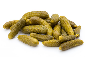 Marinated pickled cucumbers isolated on the white.