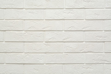 Back of a white brick wall made of gypsum