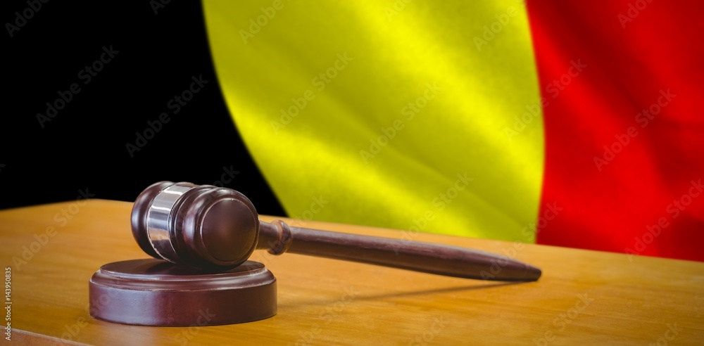 Poster composite image of close up of gavel on table