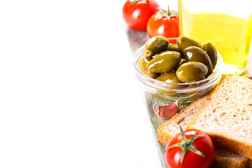 Green olives, olive oil, tomato, fresh bread