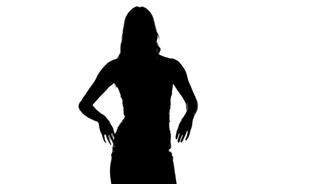 Fashion model posing. Black silhouette on white.
