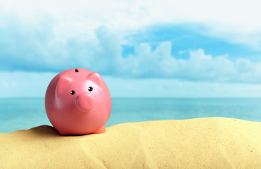 Summer piggy bank with sunglasses on the beach