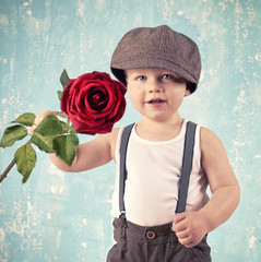 Junge mit roter Rose