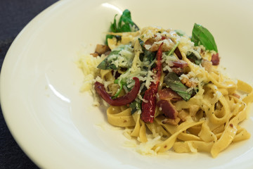 Fettuccine bacon fried basil with parmesan