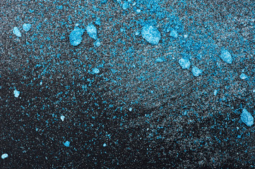 Blue Particles and Pieces of Powder and Paint