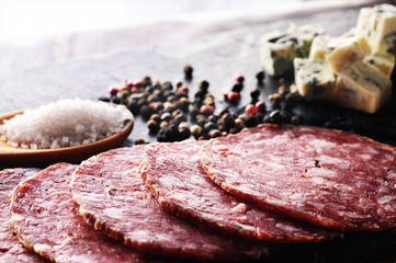 sausages and fresh cheese with salt