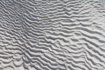 Wavy limestone texture of thermal spring in Pamukkale, Turkey