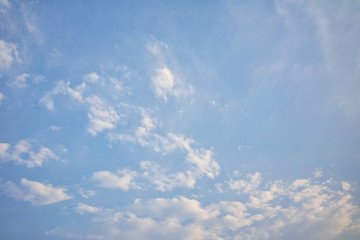 blue sky and clouds. tiny fuffy cloud under blue sky.