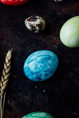 Obraz na płótnie Canvas Blue colored easter egg similar to planet Earth