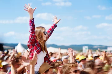 Deurstickers Teenagers at summer music festival enjoying themselves © Halfpoint