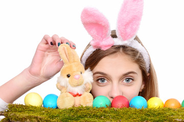 happy easter girl in bunny ears with colorful eggs, rabbit