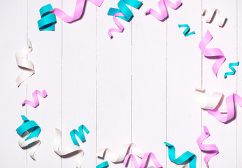 Celebration Flat lay with colorful party items on wooden background.