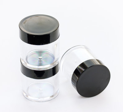 Empty Small Plastic Or Glass Jar With Black Lid