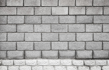 Stone wall made of gray foam concrete blocks