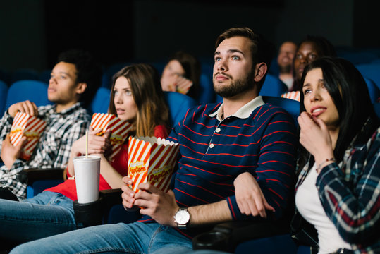 Young Couple Watching A Scary Movie