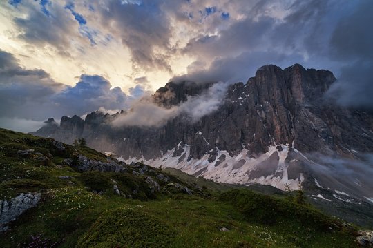 Scenic view of Monte Civetta against cloudy sky