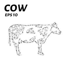 The cow consists of points, lines and triangles. The polygon shape in the form of a silhouette of a cow on a dark background. Vector illustration.