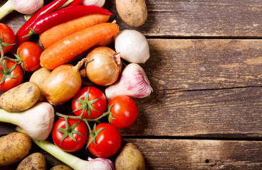 fresh vegetables on wooden table