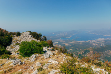 Fototapeta na wymiar View of the mountain Lovcen Tivat. Tivat Airport. Lustica Peninsula. Montenegrin coast.
