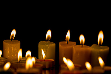 Candle flame isolated on black