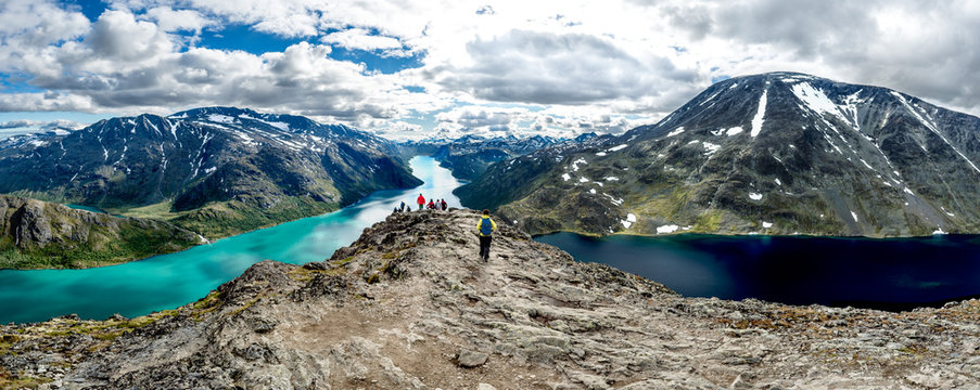 a group of tourists traveling mountains