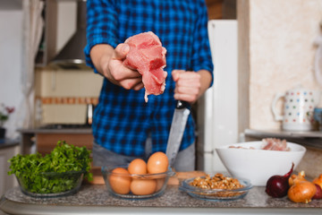 cooking food . cooking meat close