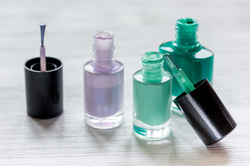 Close up of nail polish in bottles on white background