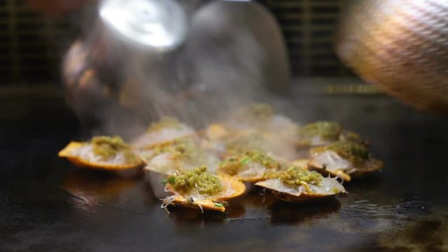 extinguish oysters under  cover on  heated surface