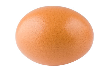 Chicken egg lies on a white background, isolated
