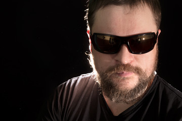 Fototapeta premium Handsome bearded man in sunglasses