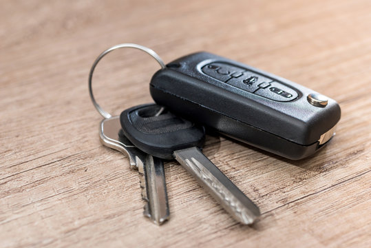 Key Fob For A Car And House Keys On A Table Stock Photo - Download Image  Now - Brass, Car Key, Close-up - iStock