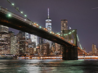 Fototapeta na wymiar Brooklyn bridge and lower Manhattan skyline at night view from DUMBO