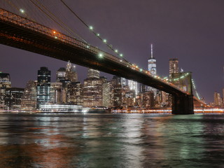 Fototapeta na wymiar Brooklyn bridge and lower Manhattan skyline at night view from DUMBO