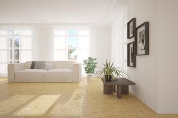 Fototapeta premium White room with sofa and green landscape in window. Scandinavian interior design. 3D illustration