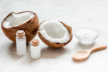 Fototapeta na wymiar coconut oil for body care in cosmetic concept on white desk