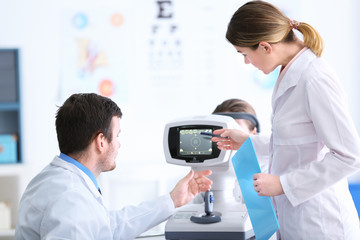Two young doctors at medical office