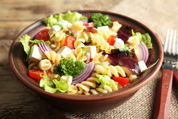 Cold delicious pasta salad, closeup