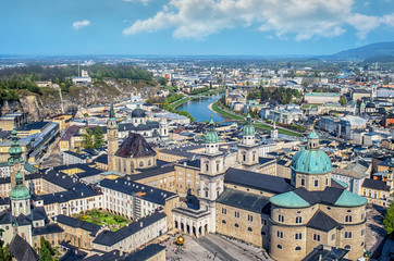 Fototapeta premium Salzburg, Austria.Panoramic view of Salzburg with Salzach river during sunny spring day 