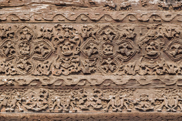 Close-up of beautiful wood carvings at the wooden Shwenandaw Monastery (also known as Golden Palace Monastery) in Mandalay, Myanmar (Burma).