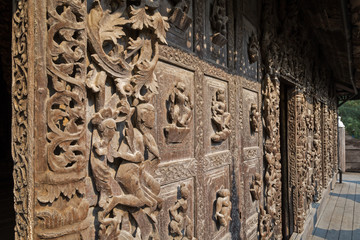 Close-up of wood carvings at the wooden Shwenandaw Monastery (also known as Golden Palace Monastery) in Mandalay, Myanmar (Burma).